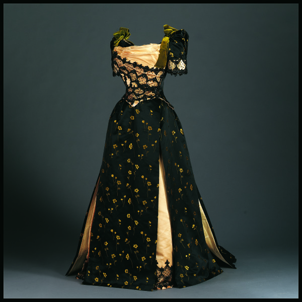 Black satin brocade bodice with yellow flowers and green velvet bows