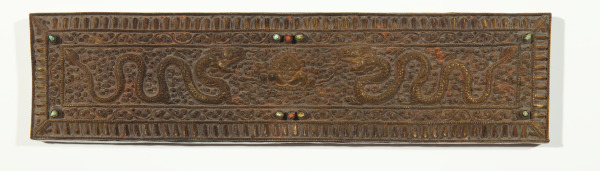 Par de cubiertas de manuscritos de bronce dorado con paneles interiores de madera pintada [incrustados con piedras de turquesa y coral]